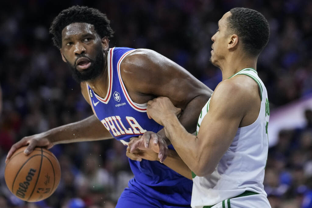 Celtics 76ers Basketball Philadelphia 76ers' Joel Embiid (left) tries to get past Boston Celtics' Malcolm Brogdon during the first half of Game 4 in an NBA basketball Eastern Conference semifinals playoff series, Sunday, May 7, 2023, in Philadelphia