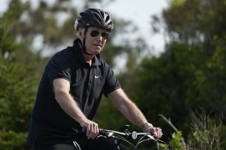 President Joe Biden goes on a bike ride in Gordons Pond State Park in Rehoboth Beach, Del.