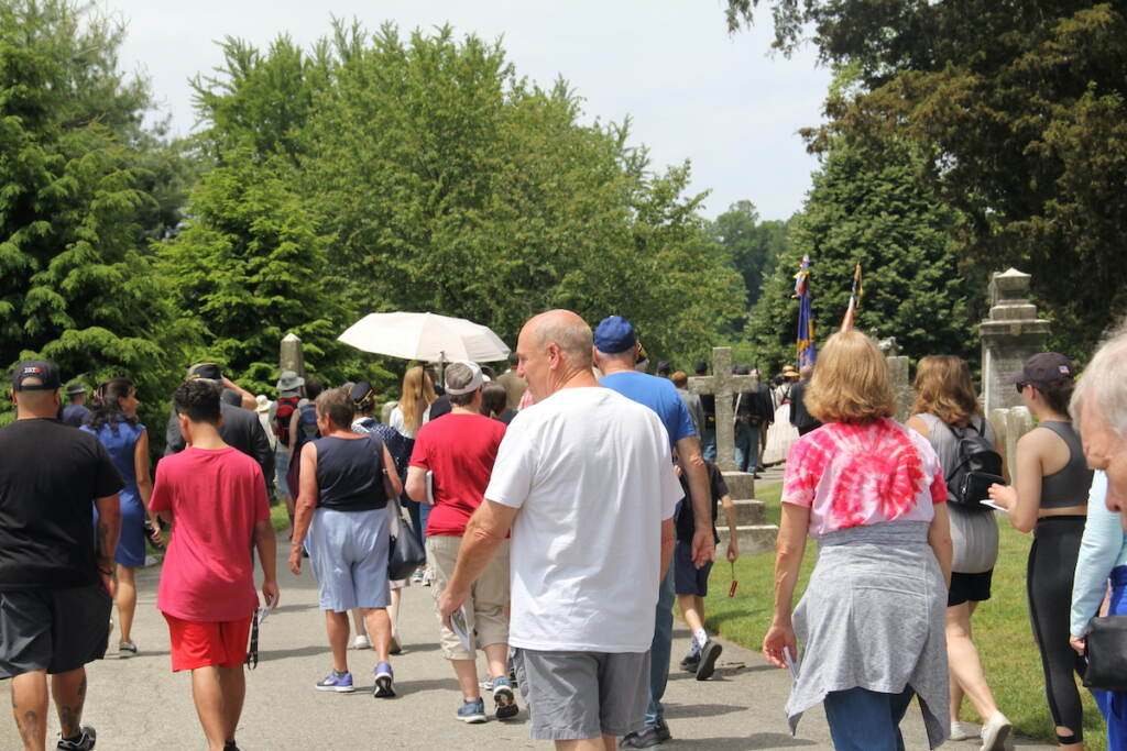 America’s veterans Memorial Day 1 People walking through Laurel Hill Cemetery