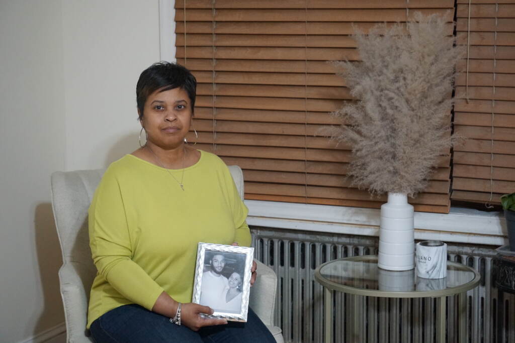 ahmad-morales-3 Tamika Morales holds a photo of herself and her son, Ahmad Morales.