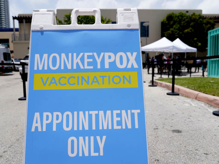 A sign for monkeypox vaccinations is shown at a vaccination site in Miami Beach