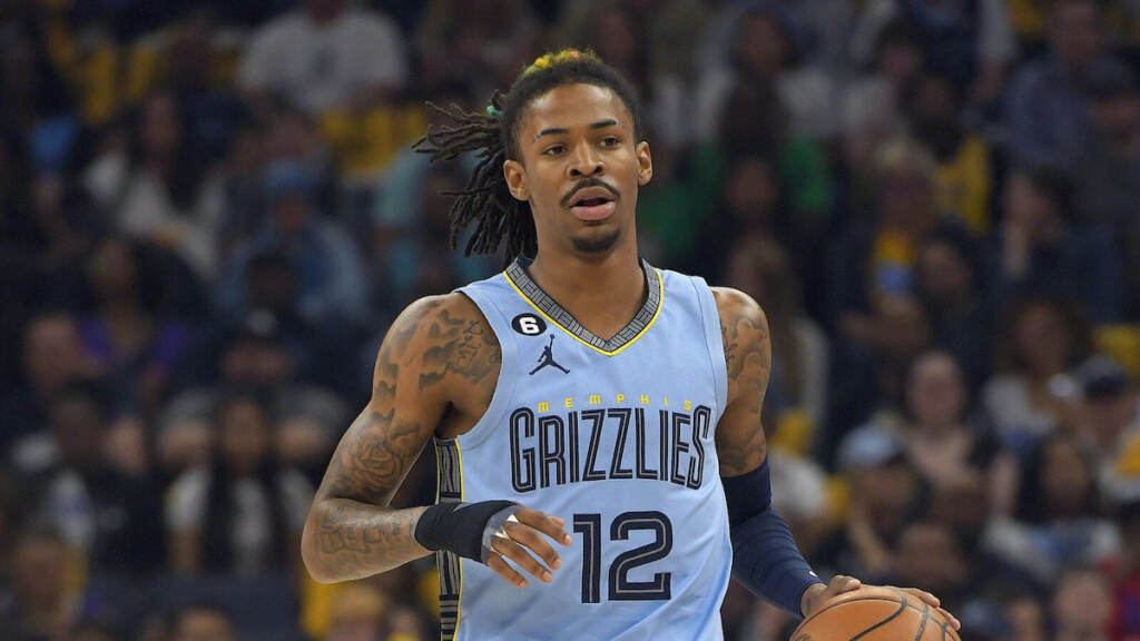 Memphis Grizzlies guard Ja Morant (12) handles the ball during the first half of Game 5 in a first-round NBA basketball playoff series against the Los Angeles Lakers Wednesday, April 26, 2023, in Memphis, Tenn. (AP Photo/Brandon Dill)