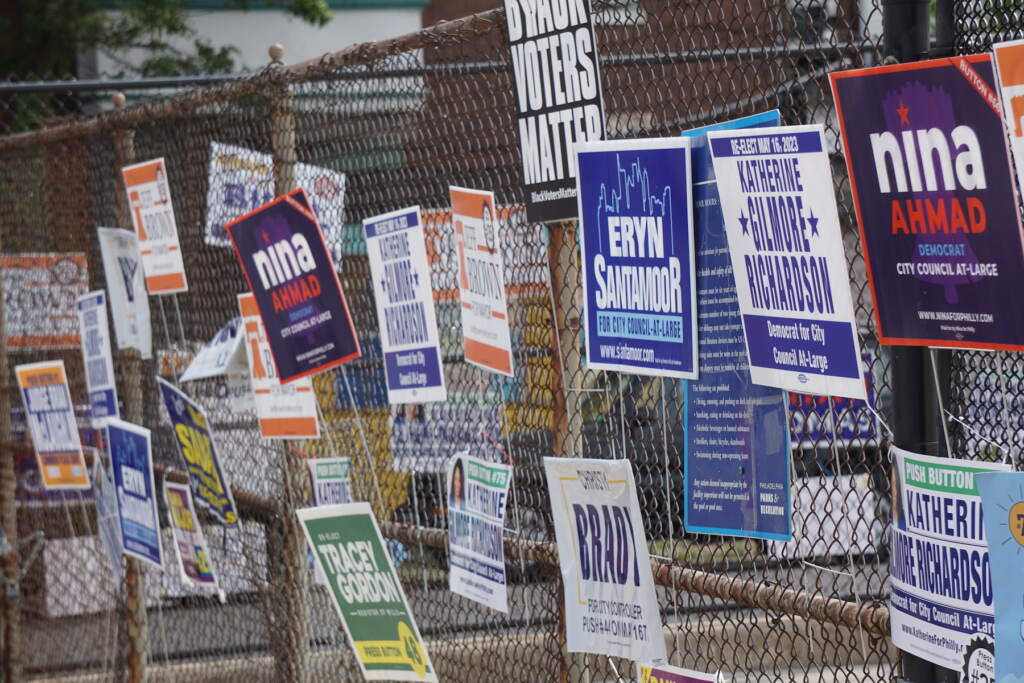 campaign-signs-election-day-s-searles-2023-05-16-2 Campaign signs on a fence