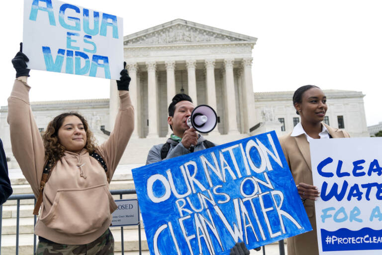 Clean Water Act supporters protest outside the Supreme Court
