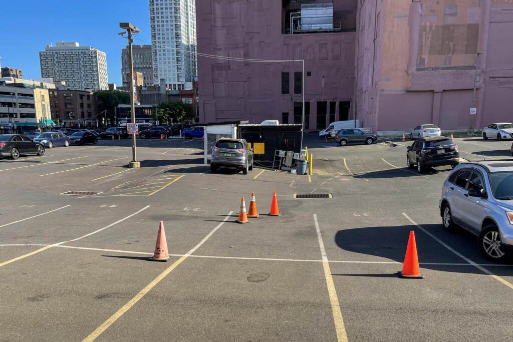 Parking lot with uneven surfaces.