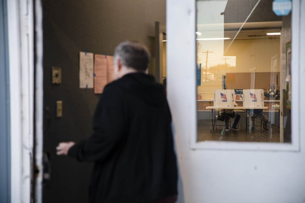 election-day-polling-place-2022-spotlight-pa Man enters polling place.
