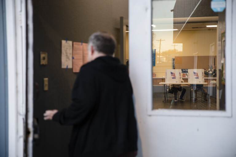 Man enters polling place.