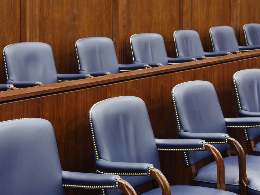 Empty Jury Seats in Courtroom Empty Jury Seats in Courtroom