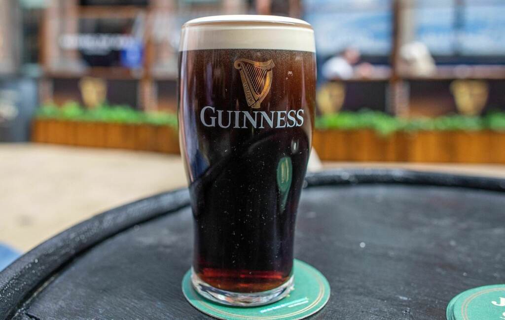 IRELAND-HEALTH-VIRUS A freshly poured pint of Guinness is pictured in Dublin, on June 7, 2021, as bars, restaurants and cafes resumed outdoor service as part of the latest lifting of Covid-19 restrictions. - Pubs, bars and restaurants in Ireland reopened outdoor service on Monday, with customers set to be allowed back inside on July 5. (Photo by PAUL FAITH / AFP) (Photo by PAUL FAITH/AFP via Getty Images)