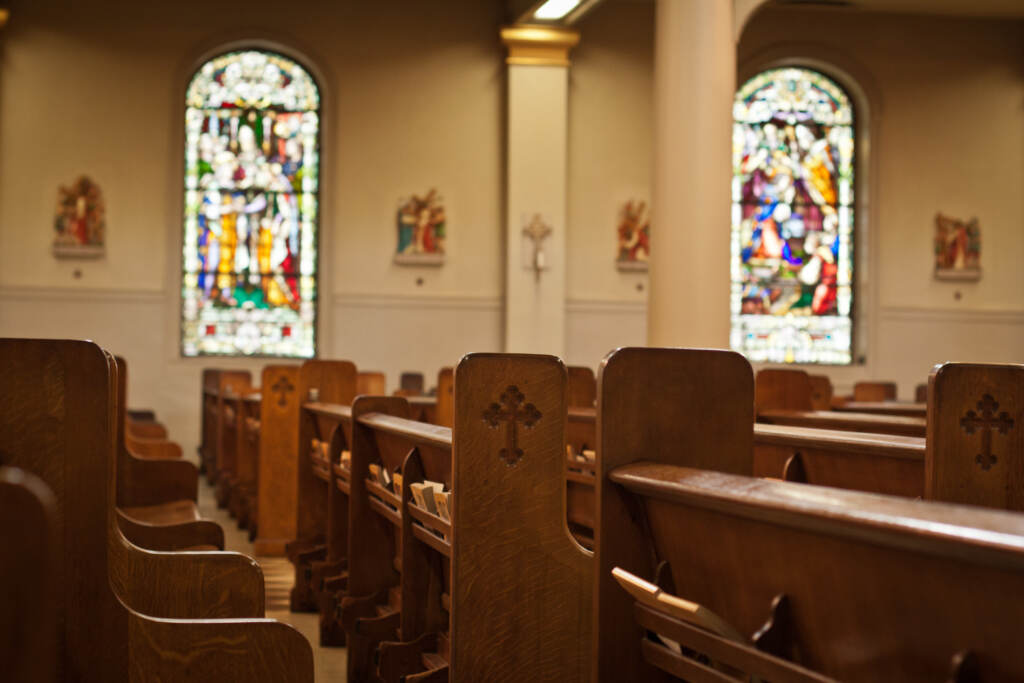 Just 16% of Americans surveyed said religion is the most important thing in their lives, according to a new report by the Public Religion Research Institute. Inside of a church with stained glass windows