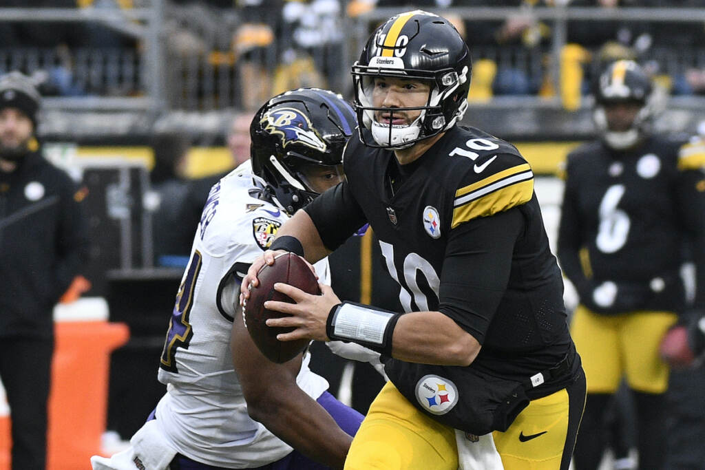Steelers Trubisky Football Pittsburgh Steelers quarterback Mitch Trubisky looks to pass under pressure from Baltimore Ravens linebacker Tyus Bowser during the second half of an NFL football game in Pittsburgh, Sunday, Dec. 11, 2022. Trubisky signed a three-year contract with the Steelers, Friday, May 19, 2023, to remain the backup behind second-year starter Kenny Pickett. (AP Photo/Don Wright, File)