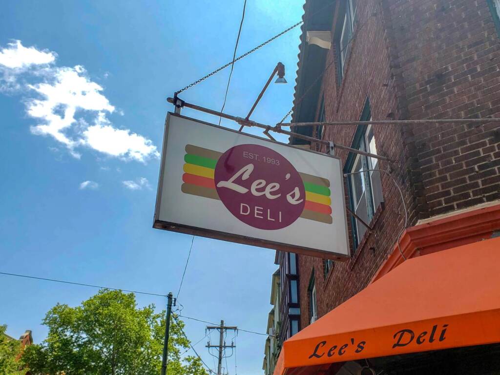 leesdeli-restaurant-05-scaled A sign reads as Lee's Deli.