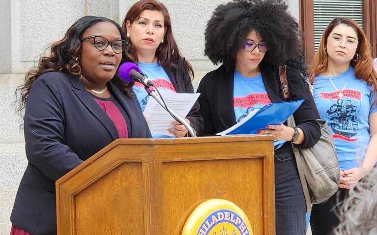 Councilmember Kendra Brooks speaks in support of raising the minimum wage. (Tom MacDonald/WHYY)