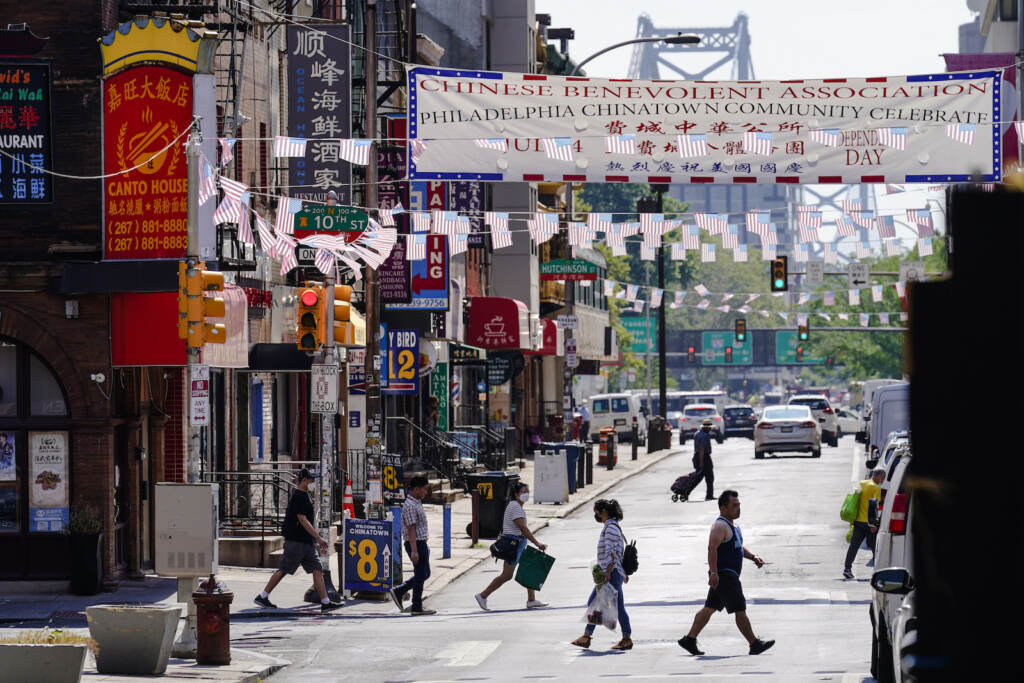 Philadelphia 76ers Arena Chinatown Pedestrians walk in Philadelphia's Chinatown