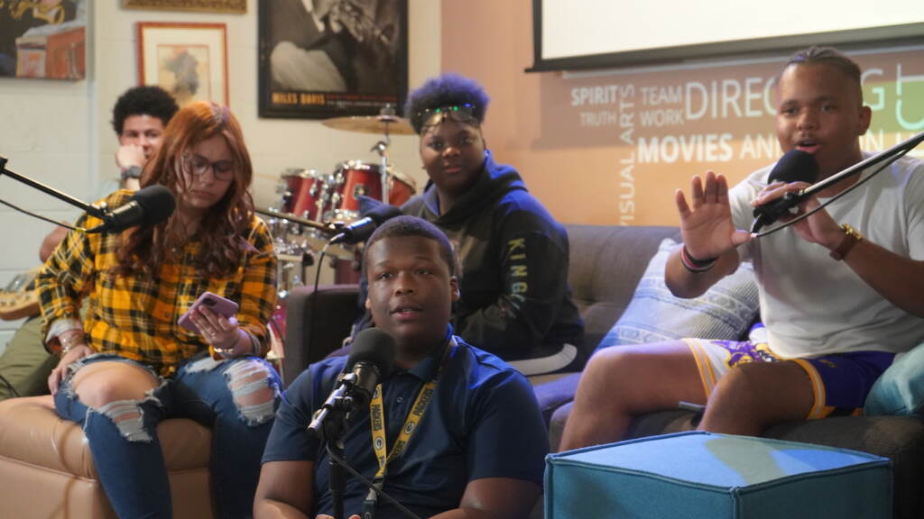 speakin-da-youth-podcast-t-donyea-2023-05-15-1 A group of young people speaking into microphones.