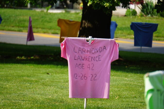 t-shirt showing the name, age, and date of death for someone killed by gun violence