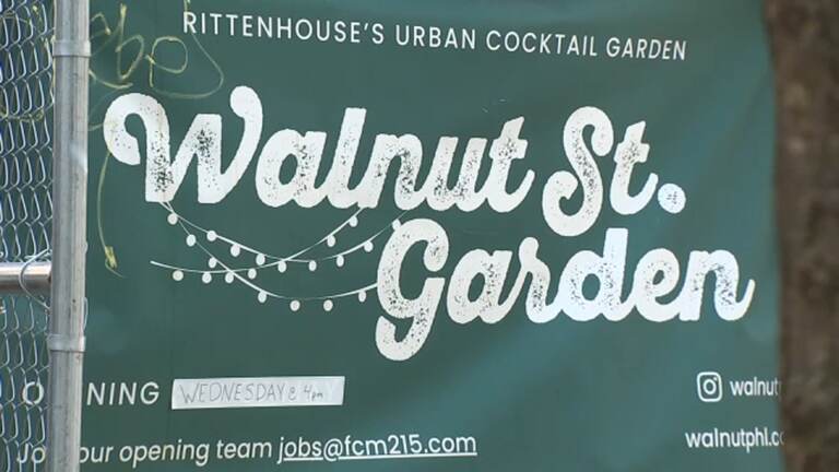 A sign for Walnut Street Garden.