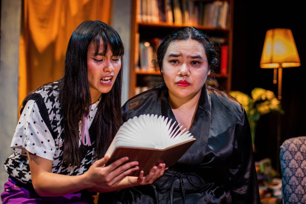 2023 06 06-provided-lexi thammavong kimie muroya-philadelphia louis bluver theatre-meet murasaki shikibu The book store manager in the play speaks with the author, Murasaki Shikibu.