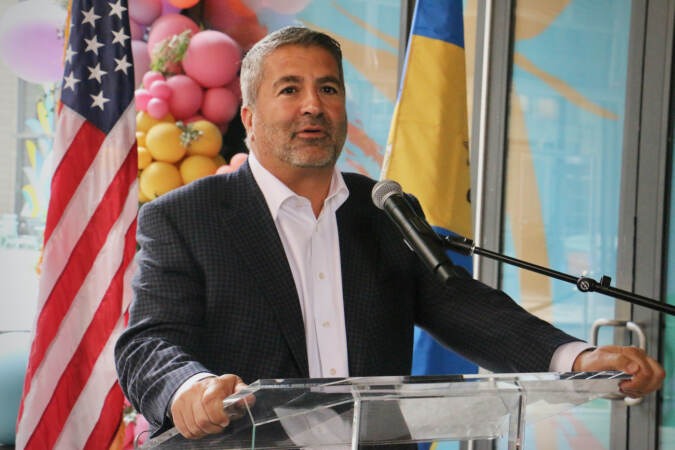 Joseph Cacchione, ceo of Thomas Jefferson University and Jefferson Health speaks at the ceremonial opening of Jefferson Plaza, a 12,000-square-foot public outdoor space that connects Market and Chestnut streets. (Emma Lee/WHYY)