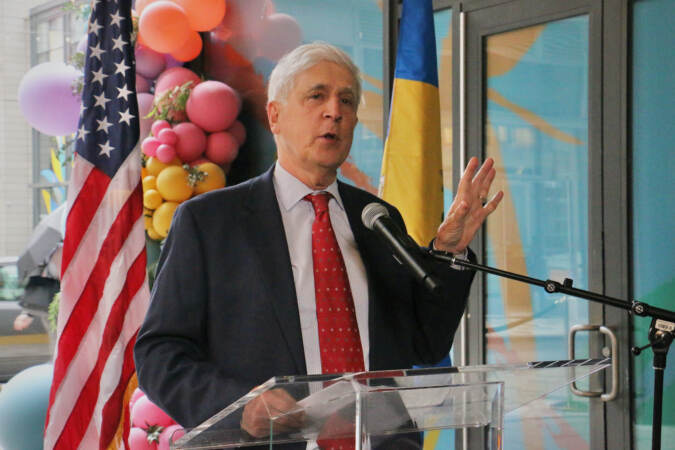 Paul Levy, president and CEO of Center City District,speaks at the ceremonial opening of Jefferson Plaza, a 12,000-square-foot public outdoor space that connects Market and Chestnut streets. (Emma Lee/WHYY)