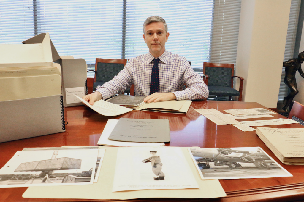 Patrick Shea, chief curator of archives and manuscripts for the Othmer Library of Chemical History at the Science History Institute, looks through the documents and photographs of the J. Hartley Bowen Jr. papers. (Emma Lee/WHYY)