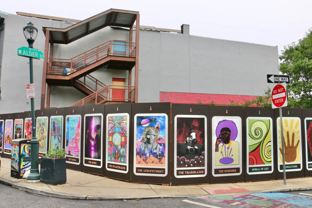 Colorful large tarot cards on the wall