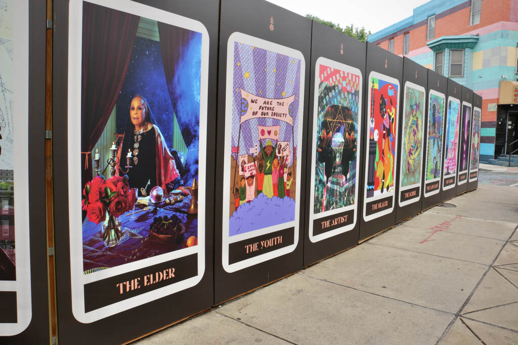 Colorful large tarot cards on the wall