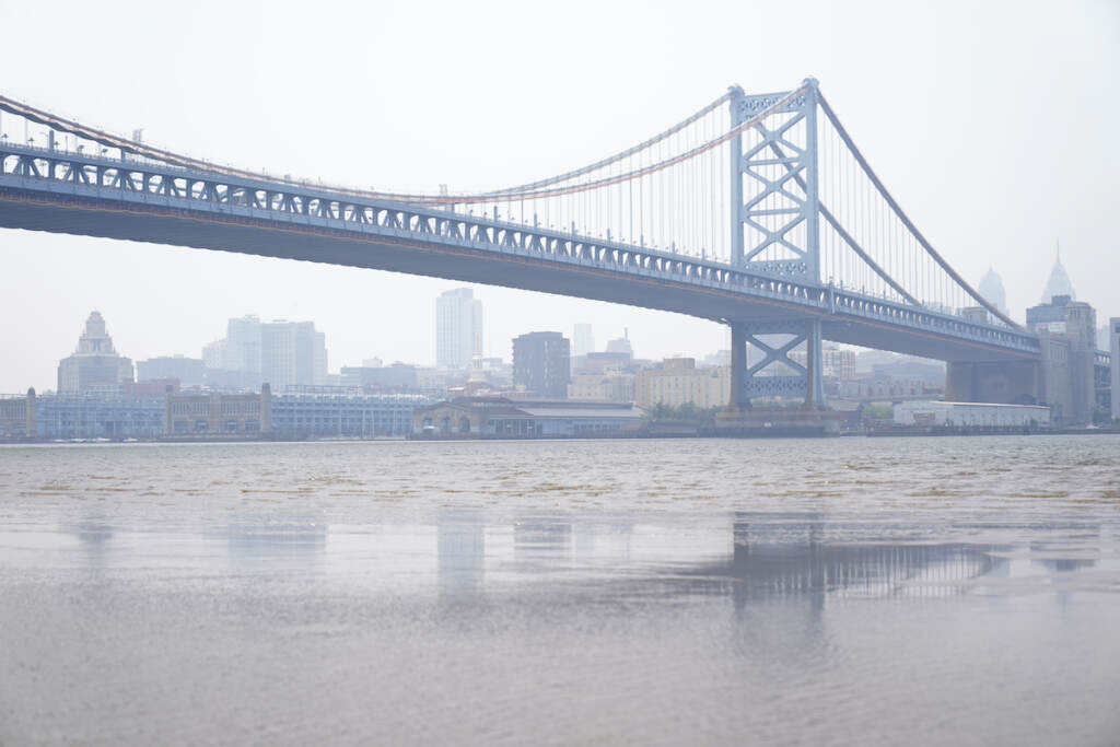 Canada Wildfires Pennsylvania The Benjamin Franklin Bridge and the Philadelphia skyline are shrouded in haze, Wednesday, June 7, 2023. Intense Canadian wildfires are blanketing the northeastern U.S. in a dystopian haze, turning the air acrid, the sky yellowish gray and prompting warnings for vulnerable populations to stay inside.