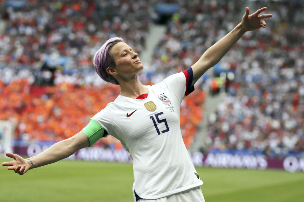 In this July 7, 2019 file photo, United States' Megan Rapinoe celebrates after scoring the opening goal from the penalty spot during the Women's World Cup final soccer match against The Netherlands at the Stade de Lyon in Decines, outside Lyon, France