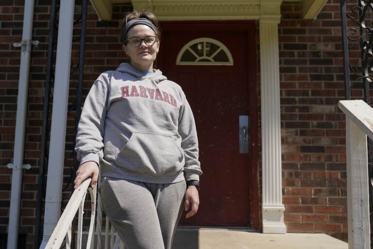 Samantha Richards stands outside of her apartment, Friday, June 9, 2023, in Bloomington, Ind. Richards has been on Medicaid her whole life and currently works two part-time jobs as a custodian