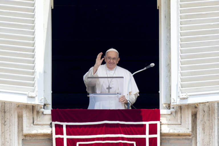 Pope Francis delivers his blessing as he recites the Angelus noon prayer from the window of his studio overlooking St.Peter's Square, at the Vatican, Sunday, June 18, 2023