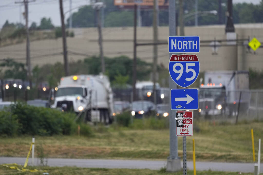 I-95 Collapse Traffic barely moves in a neighborhood near an elevated section of Interstate 95
