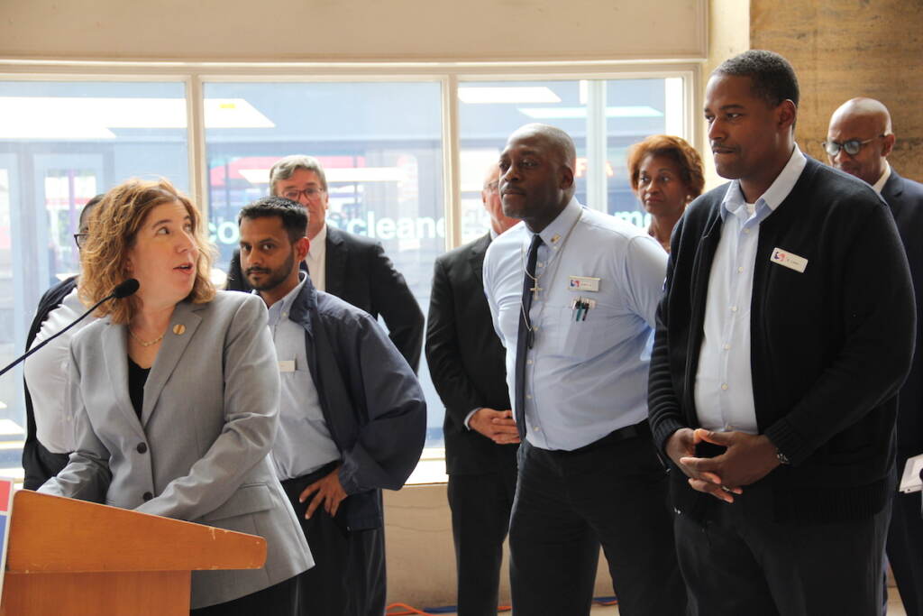 SEPTA CEO Leslie Richards stands next to four SEPTA bus drivers who will be piloting the fleet of zero-emission buses