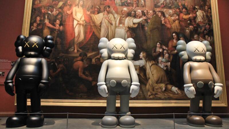 Fiberglass KAWS Companion sculptures invite a comparison between the old and new and PAFA hopes to create a dialogue on the topic. (Kimberly Paynter/WHYY)