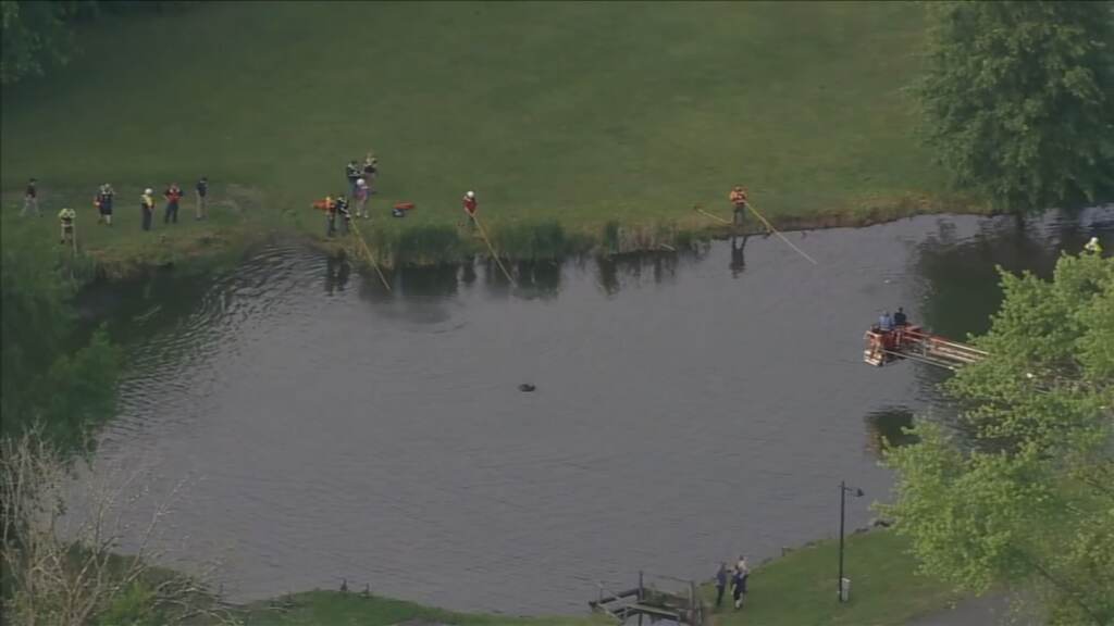 Crews search a pond for a missing boy in Bucks County