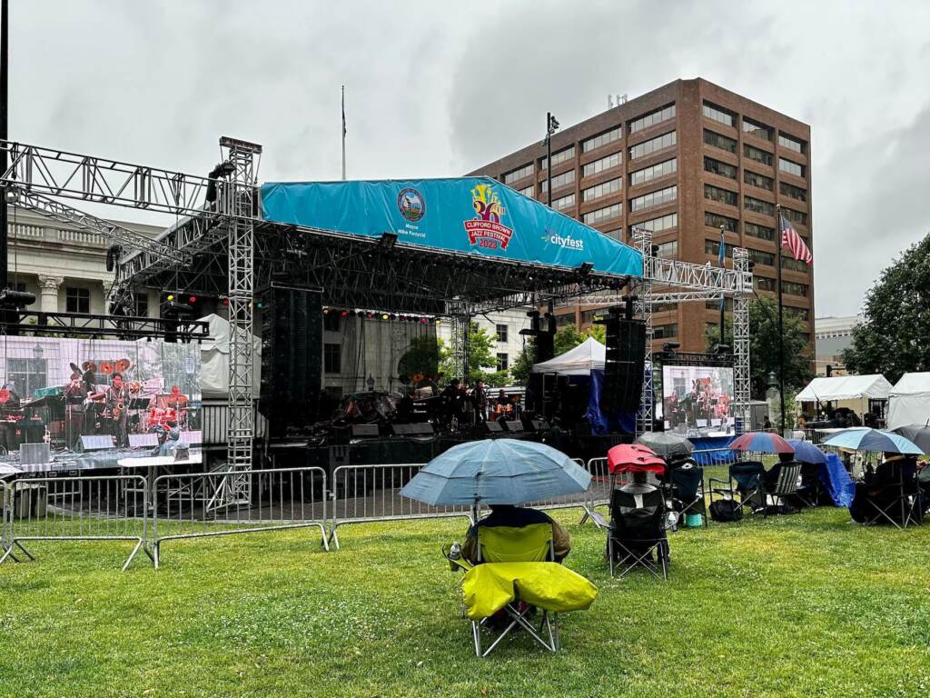 clifford-brown-jazz-festival-rodney-square-2023-06-22 Festival stage in the rain.