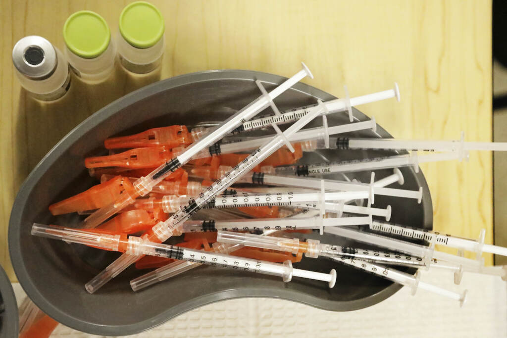 a bowl of syringes.