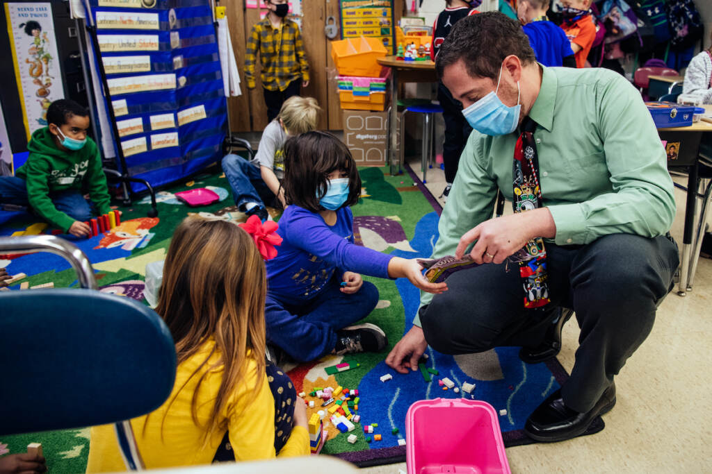 Rob Palazzo interacting with students in the classroom