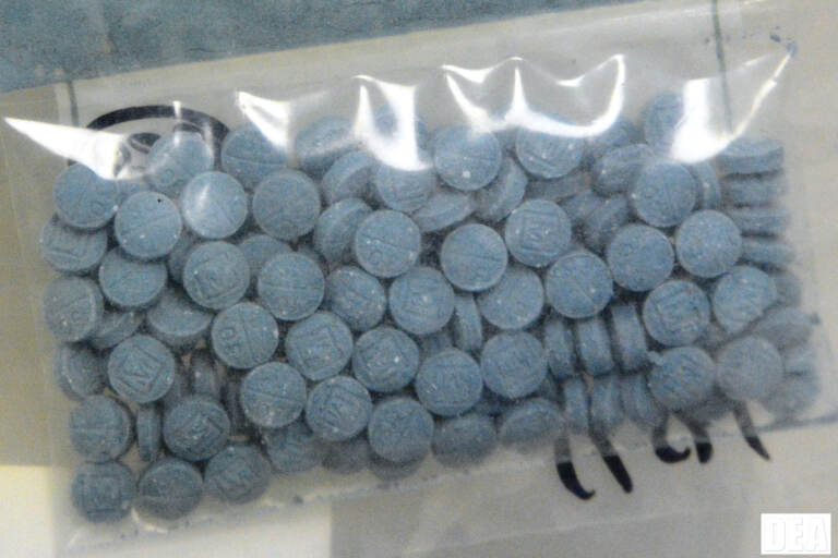 a bag of blue pills