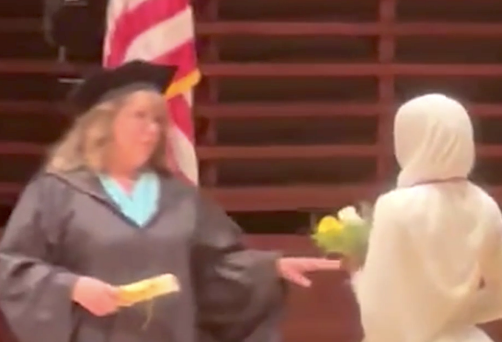 girls-high-grad-6abc Graduation ceremony, with student getting denied a diploma.