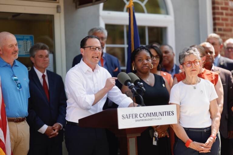 Governor Josh Shapiro speaks at a podium.