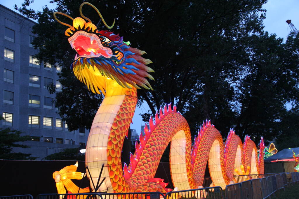 A dragon lantern is lit up at the park.
