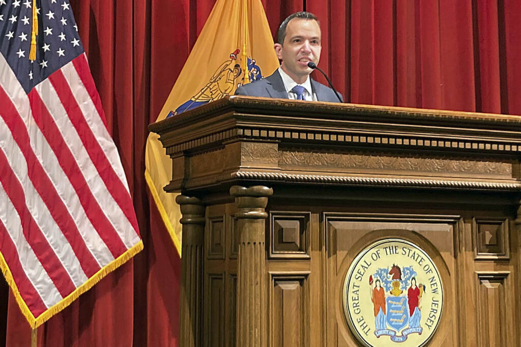 Matt Platkin speaking at a podium