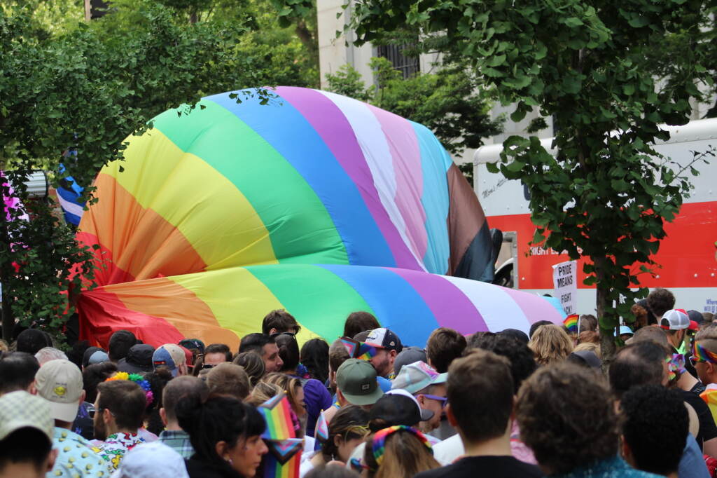 philly-pride-c-sharber-2023-06-04-19 Massive pride flag getting unfurled at Philly Pride.