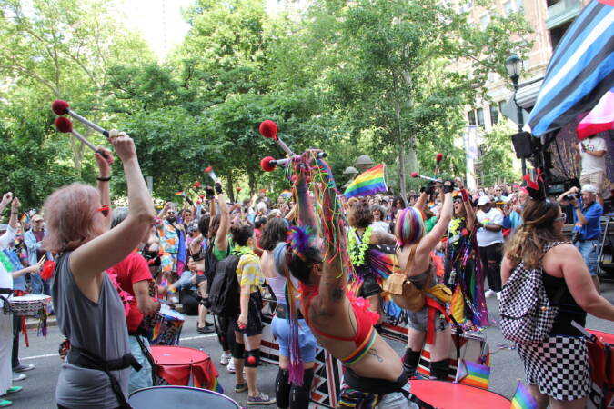 Drummers on the street in the middle of a festival.