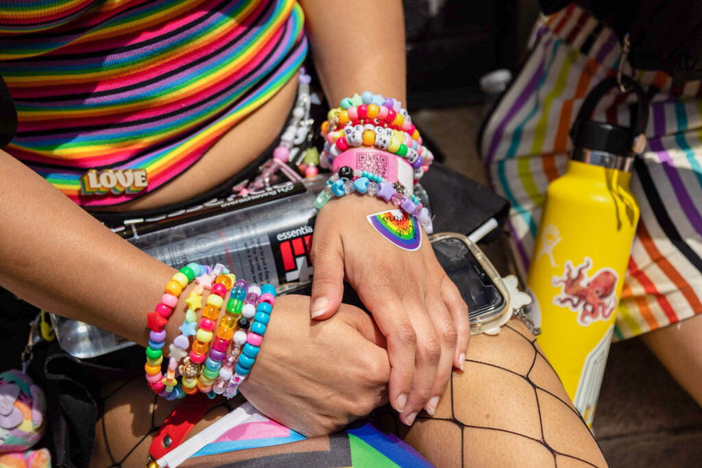 phillypride-march-parade-bracelets A participant in the 2023 Philly Pride decked out in rainbow bracelets