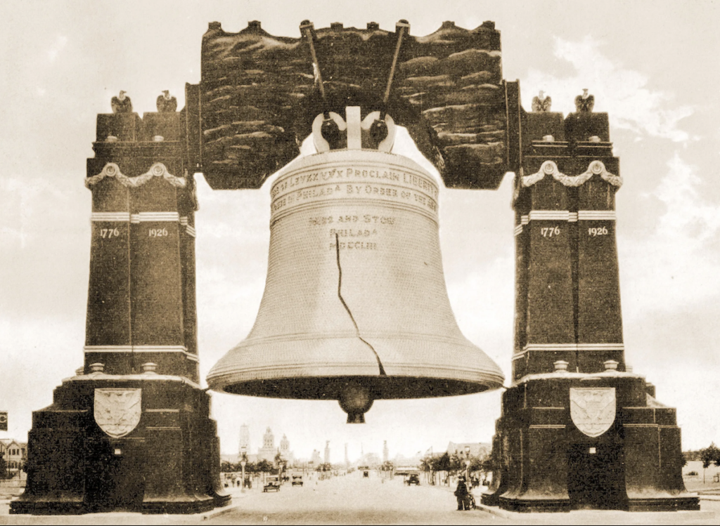 sesquicentennial-liberty-bell-bp Historical photo of the 'Luminous Liberty Bell' hanging across Broad Street.