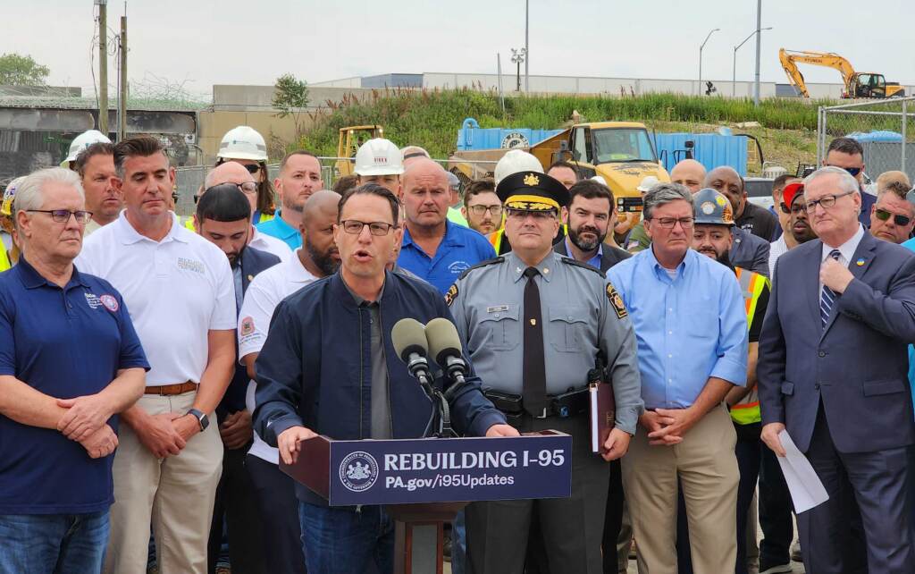 shapiro-i95-t-macdonald-2023-06-14 Josh Shapiro speaking at a podium at the collapse site.