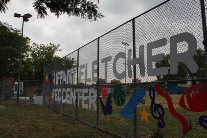 Sign for Tiffany Fletcher Rec Center on the fence