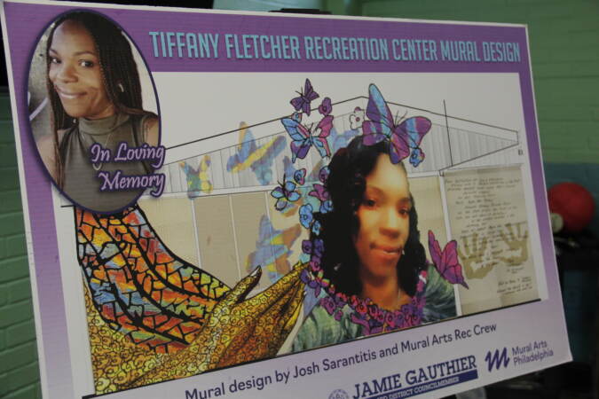 Sign showing the mural of Tiffany Fletcher
